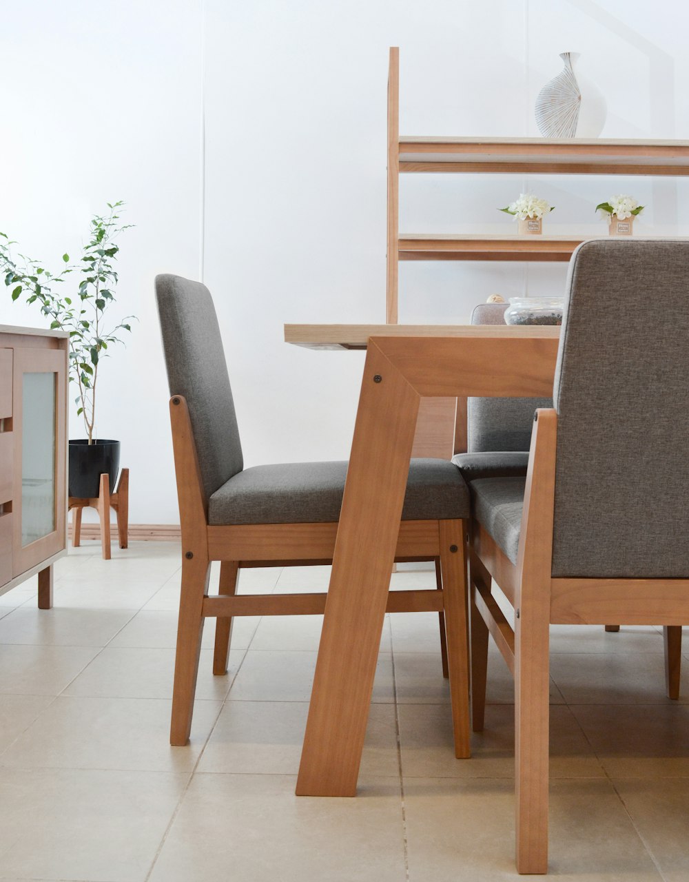 A thoughtfully styled dining area with a table and chairs